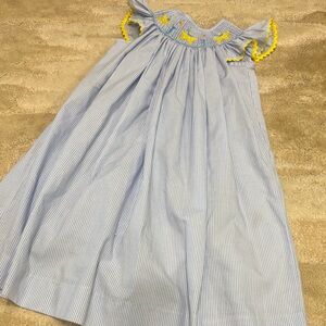 Castles & Crowns— Blue & White Pinstripe Smocked Sundress with Yellow Trim